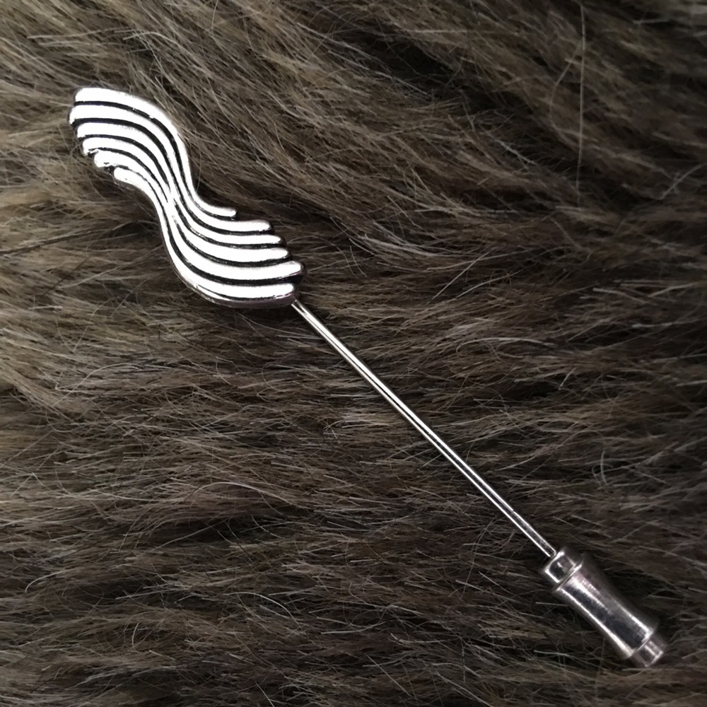 Vintage Sarah Coventry silver swirl stick pin